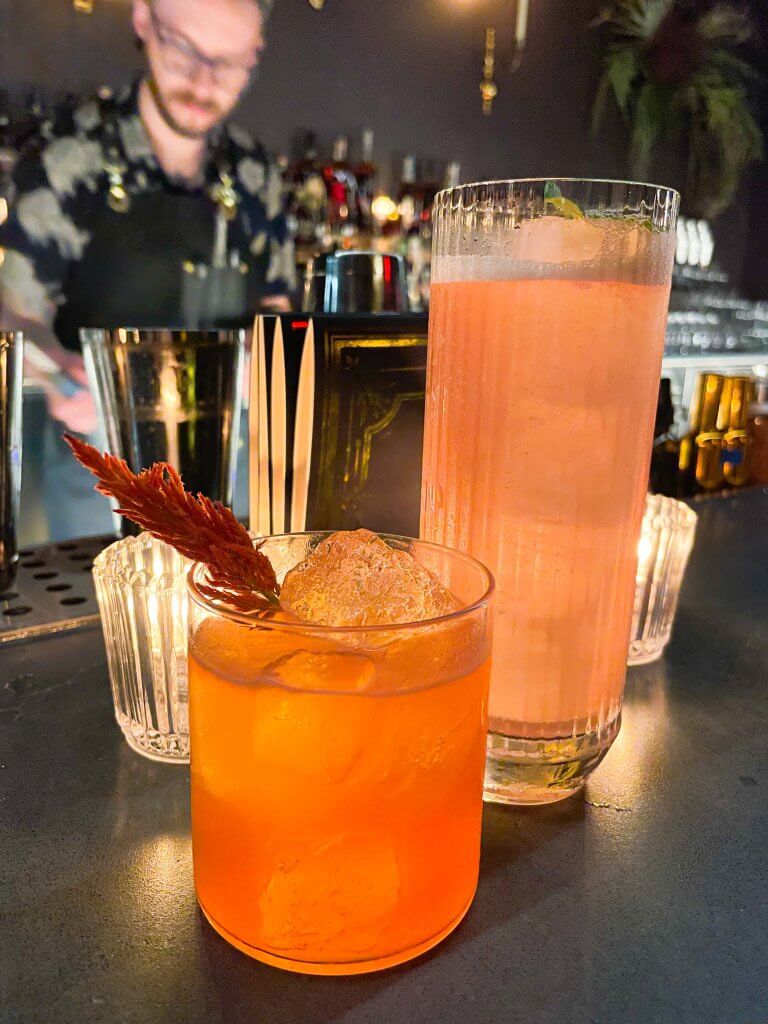 Two cocktails sit on the bar top at Thick as Thieves in Boise.