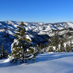 View of mountain tops while snowshoeing.