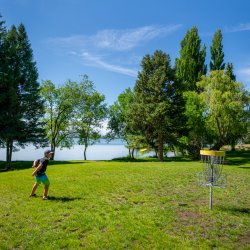 A child playing disc golf at Lake Walcott State Park.