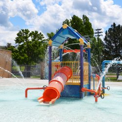 A water park playground at Ross Park Aquatic Complex spraying water.