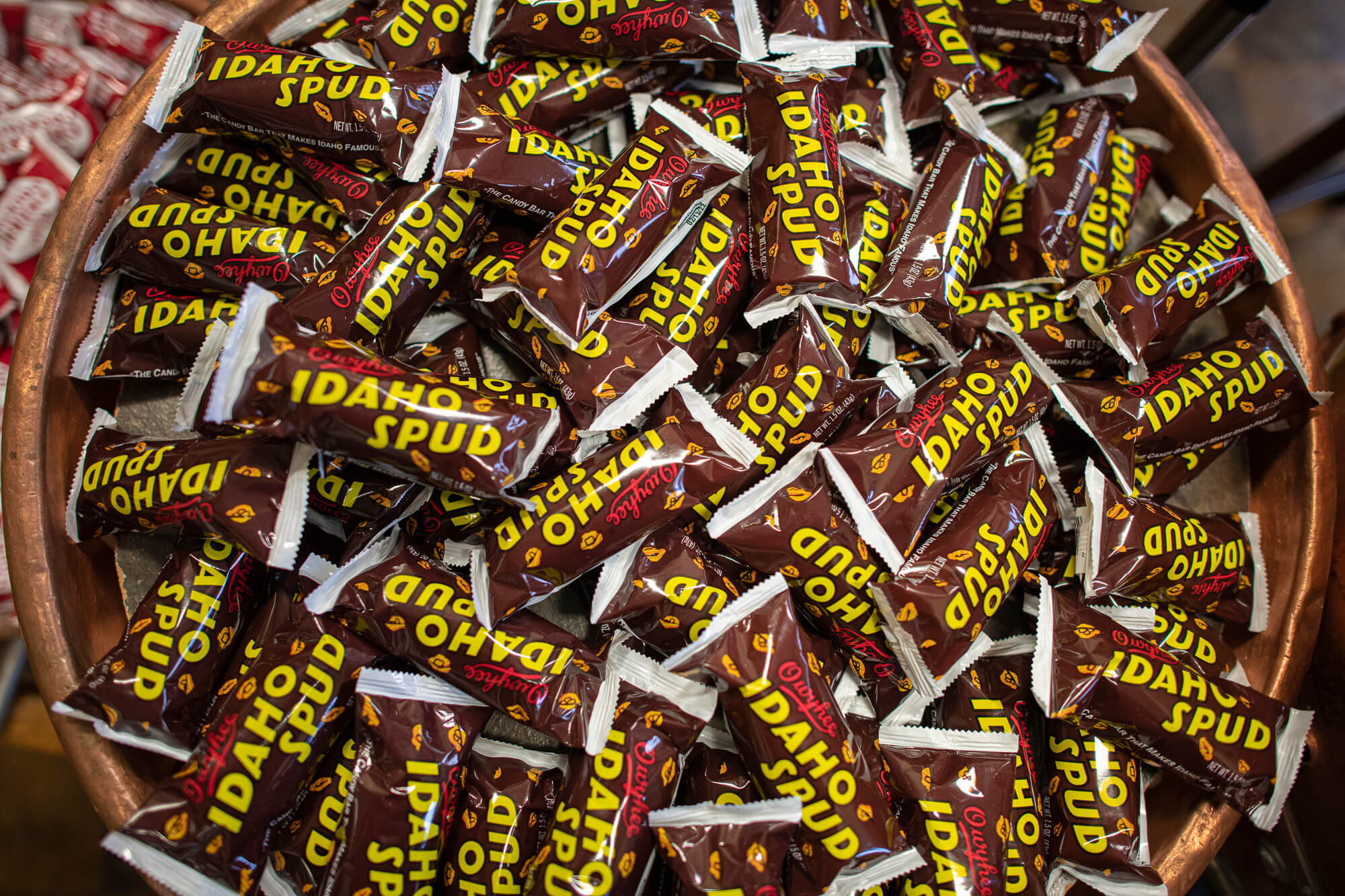 A top-view of a barrel filled with Idaho Spud Bars.