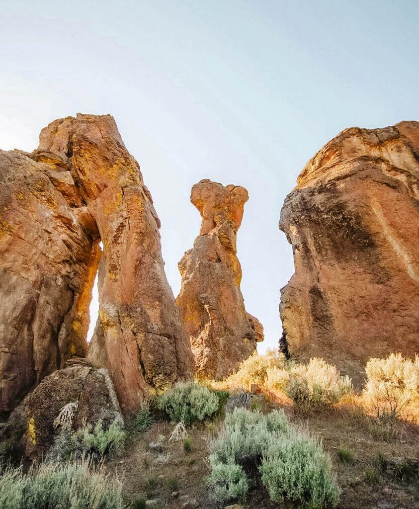 Closeup of towering rock structures amidst a desert landscape at Little City of Rocks.