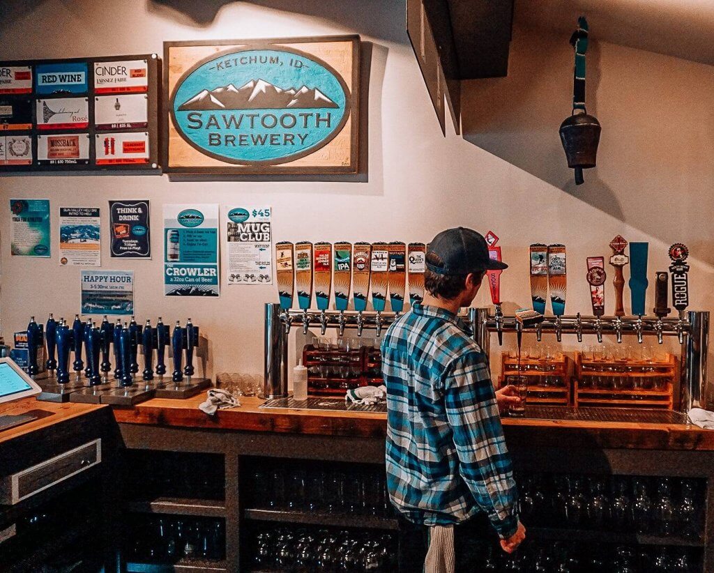 A person pours beer from a tap at Koto Brewing Company in Twin Falls.