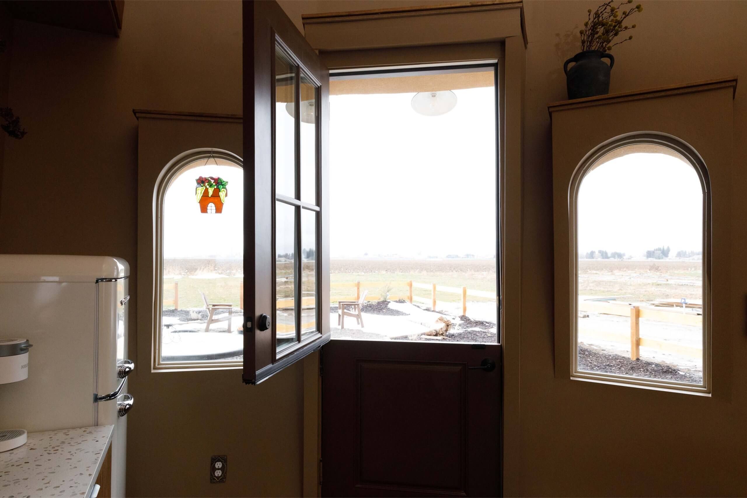 A window opens overlooking the field from inside the Flower Pot in Burley, Idaho.