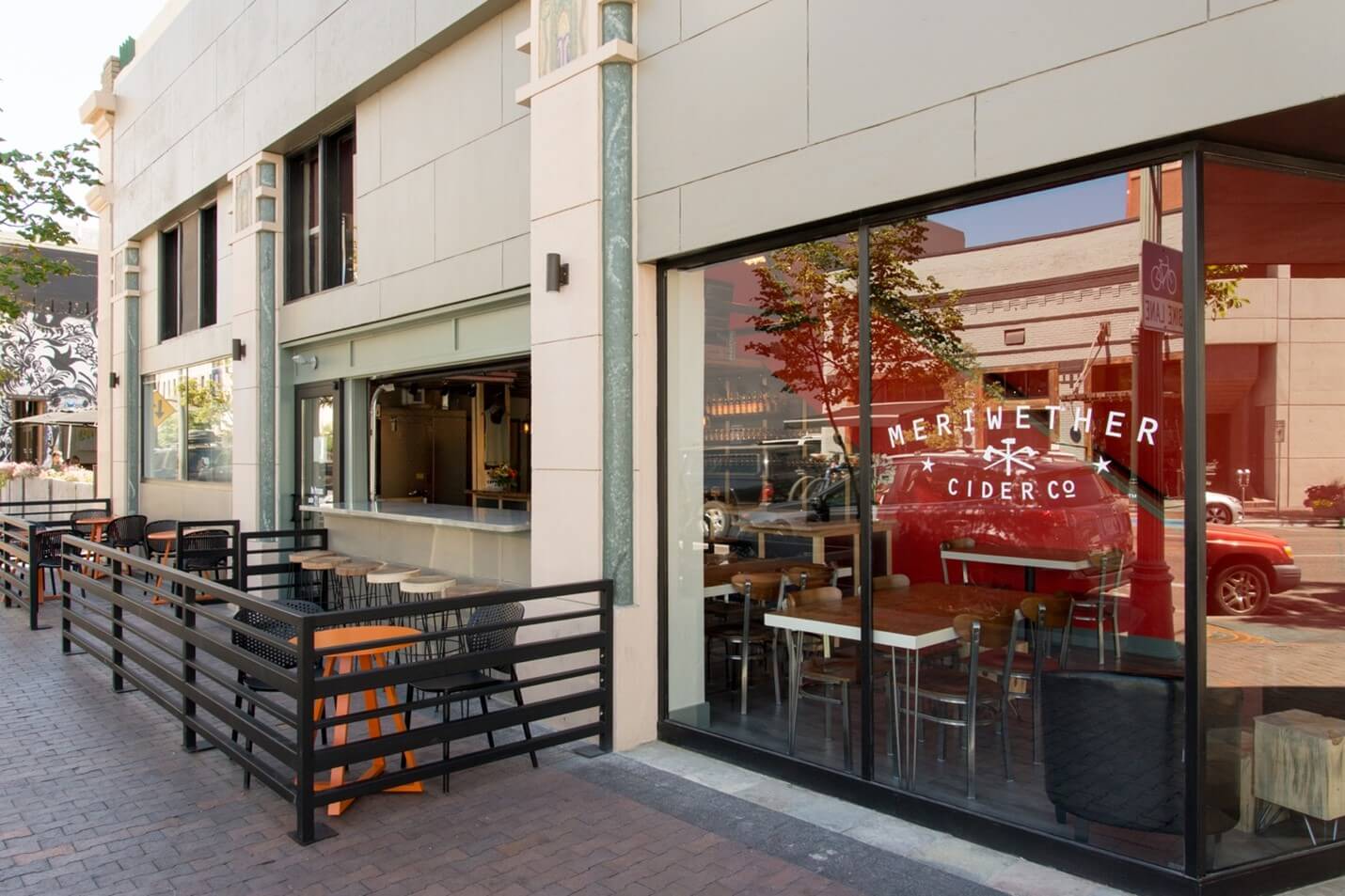 An exterior view of Meriwether Cider Company and the patio.