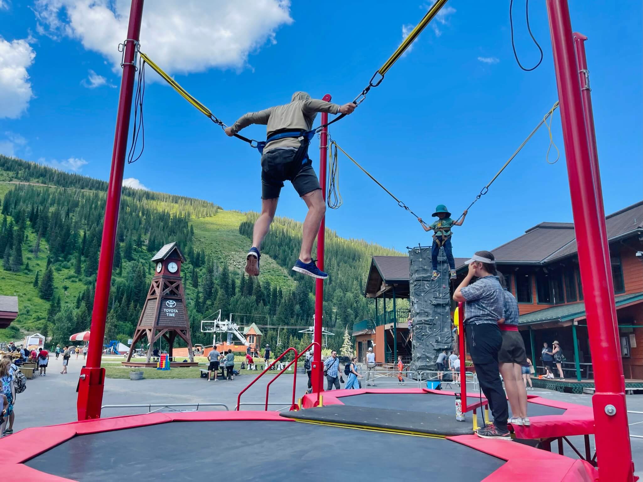 man jumps on trampoline