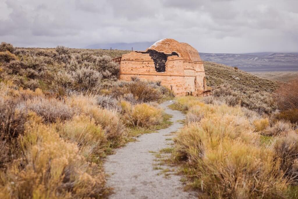 The Charcoal Kilns Interpretive Site surrounded by desert brush. 