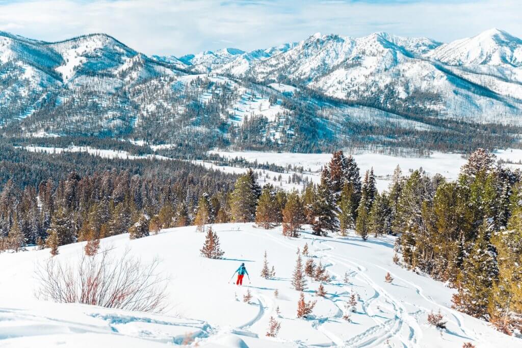 Snow-covered Galena Summit Overlook near Stanley, Idaho, showcasing a panoramic view of the mountains.