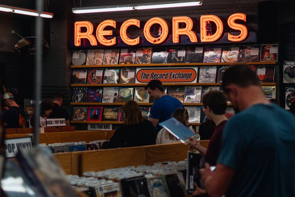 A neon Records sign at The Record Exchange in Boise.