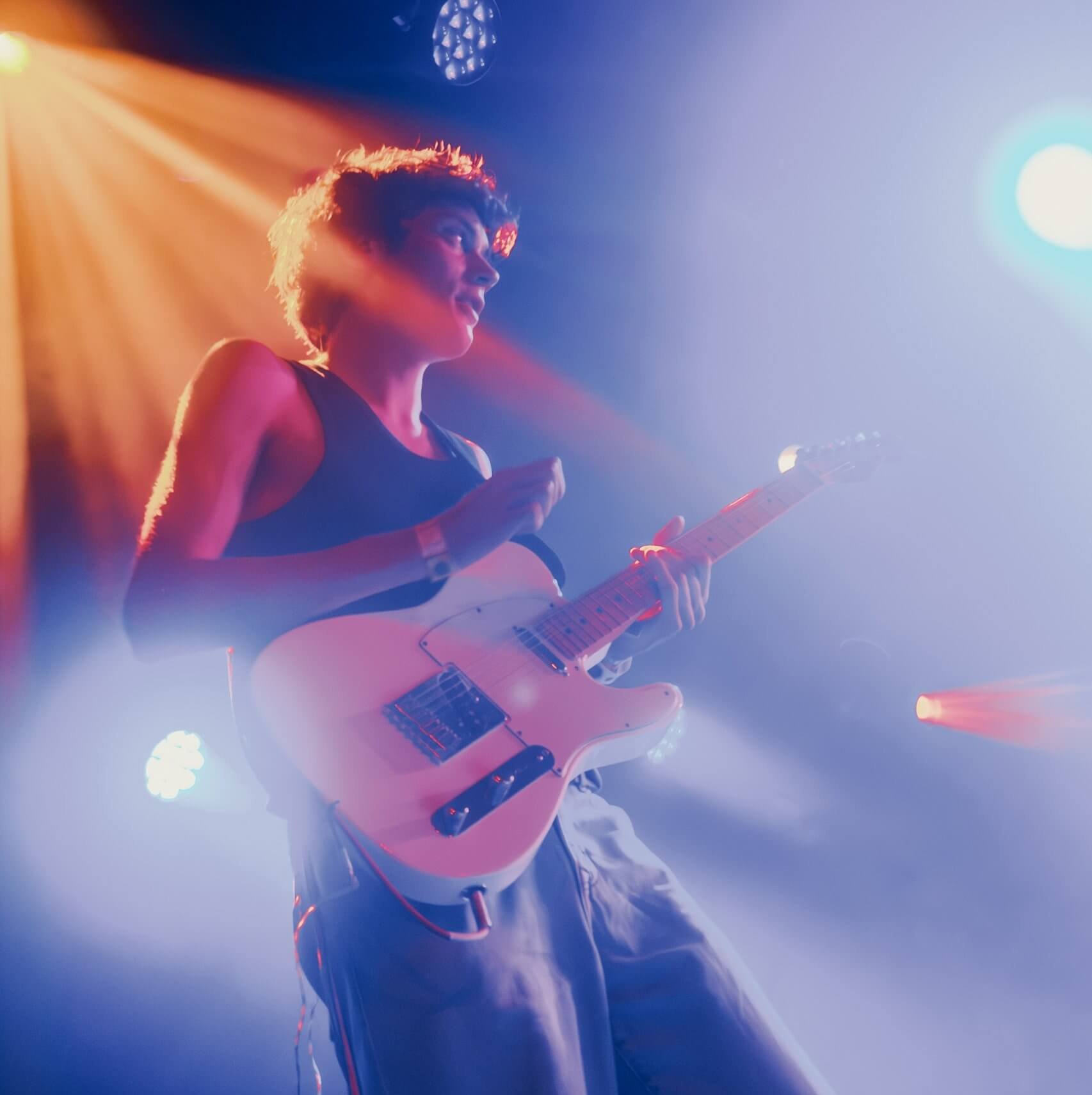 Porij plays guitar at Treefort Music Fest.