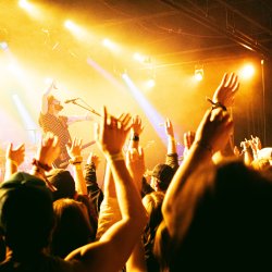 People put their hands up at a Magic City Hippies concert during Treefort.