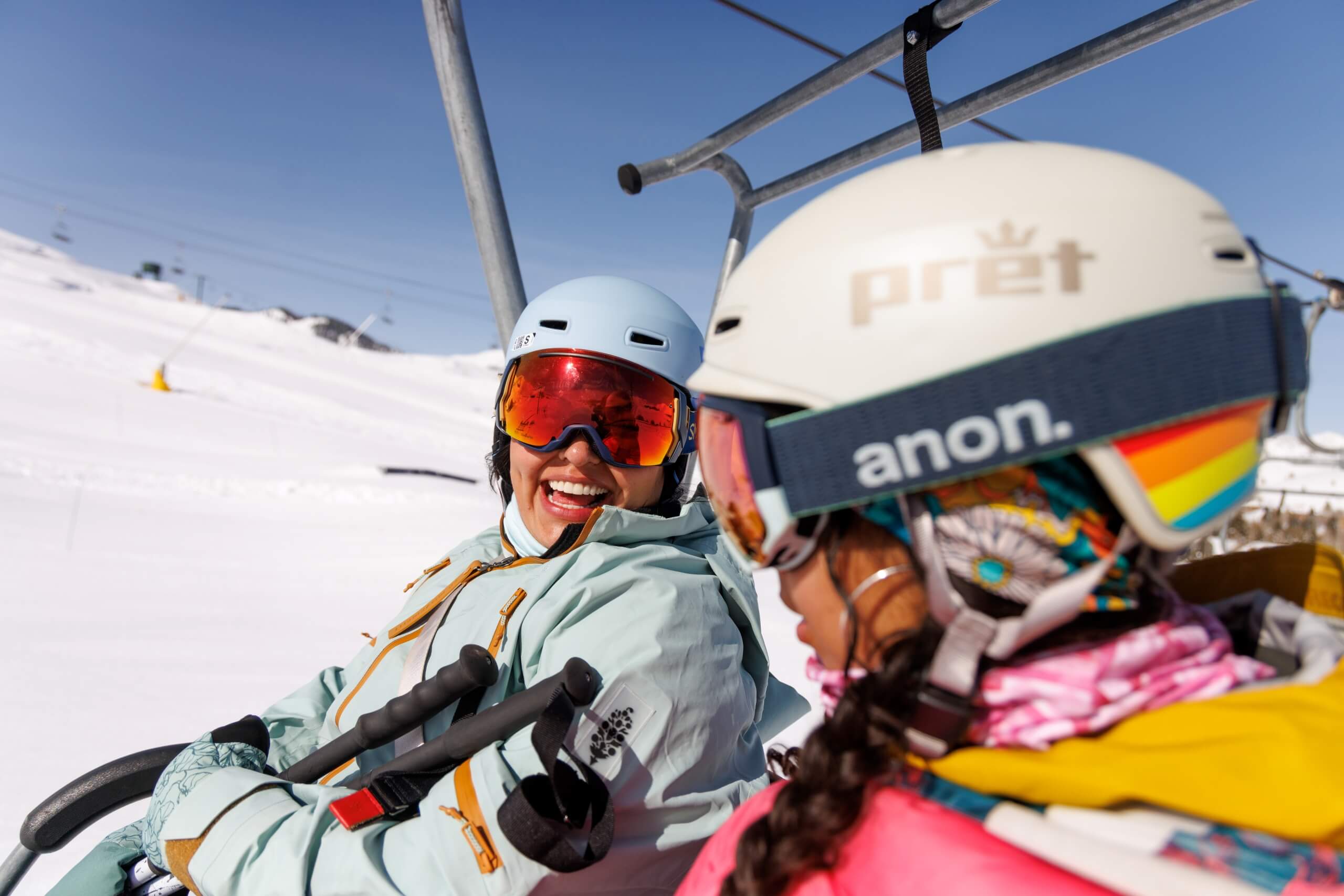 two women on chairlift on Dollar Mountain Sun Valley