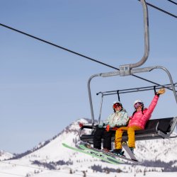 two women on chairlift on Dollar Mountain Sun Valley