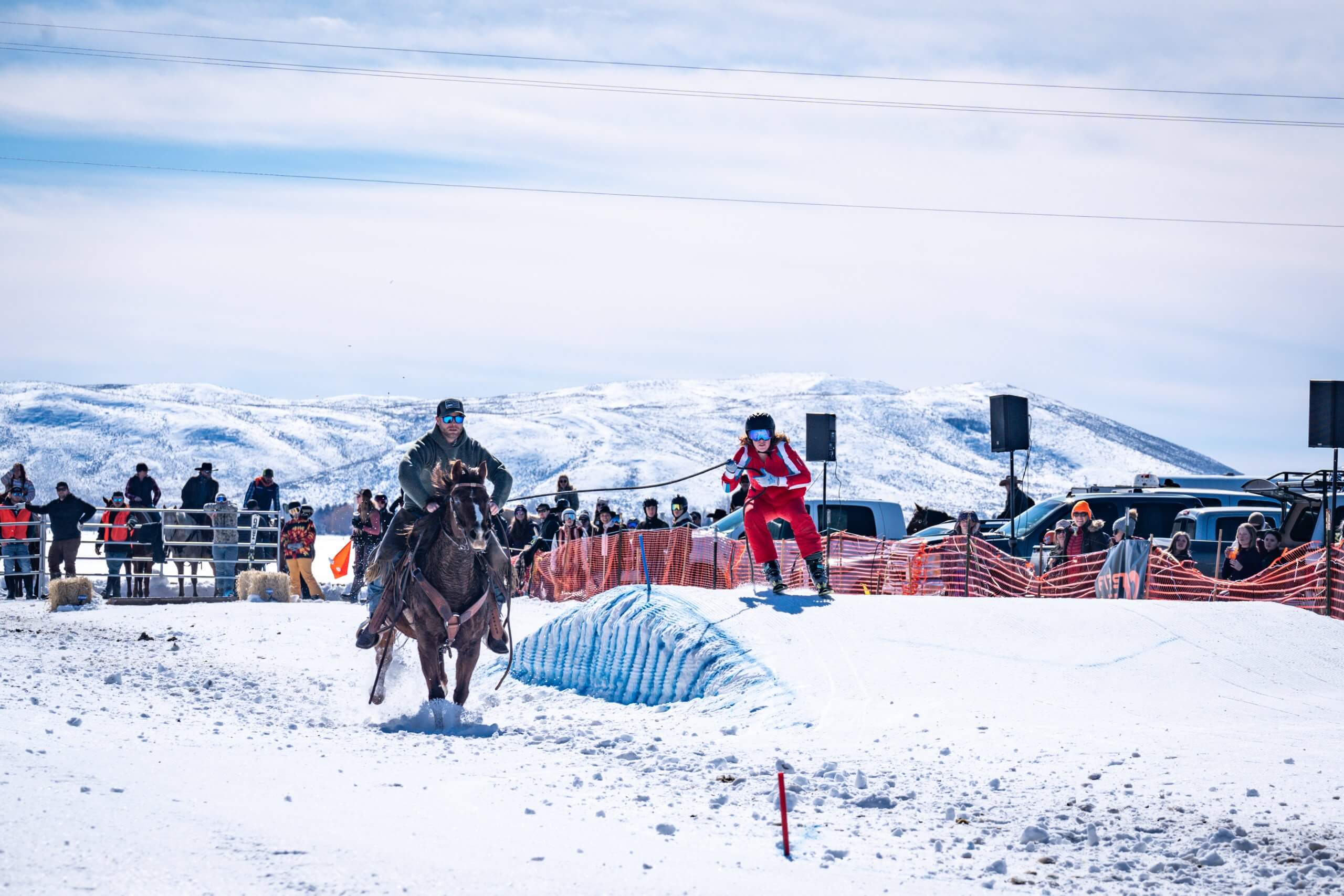 skier hits jump at skijoring event