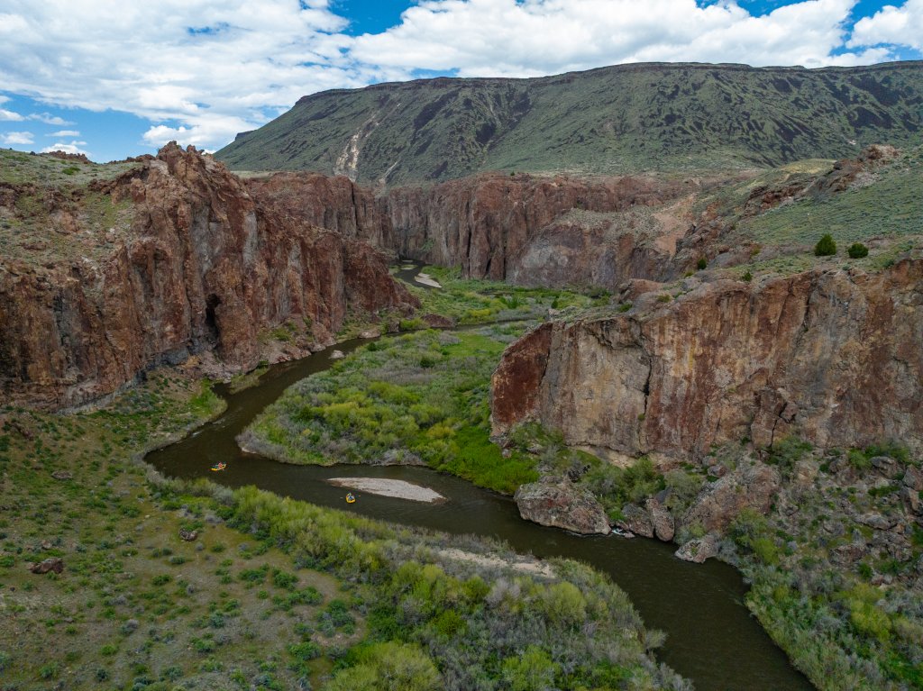 Rafters on the Bruneau River with Barker River Expeditions navigating desert canyon rapids