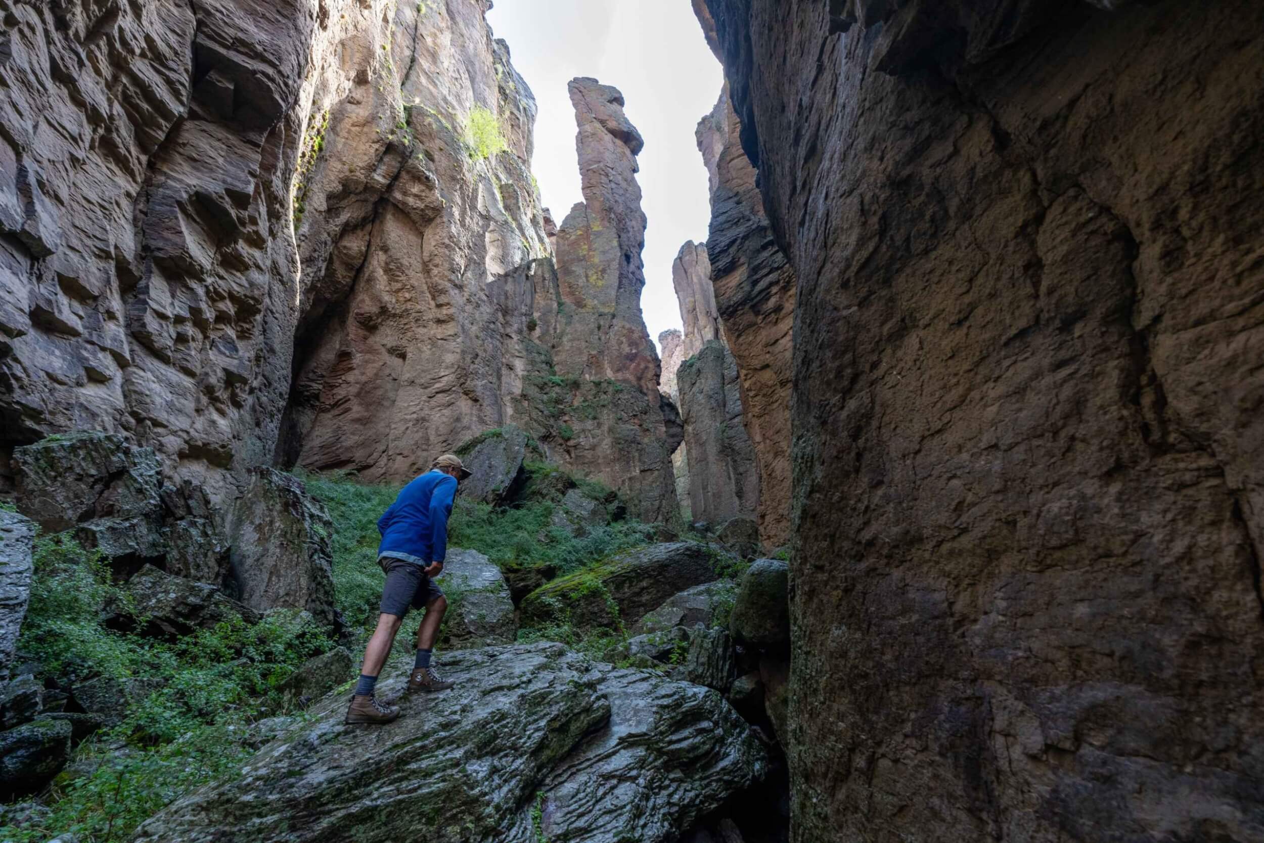 Jon Barker explores a rugged slot canyon above the Bruneau River.