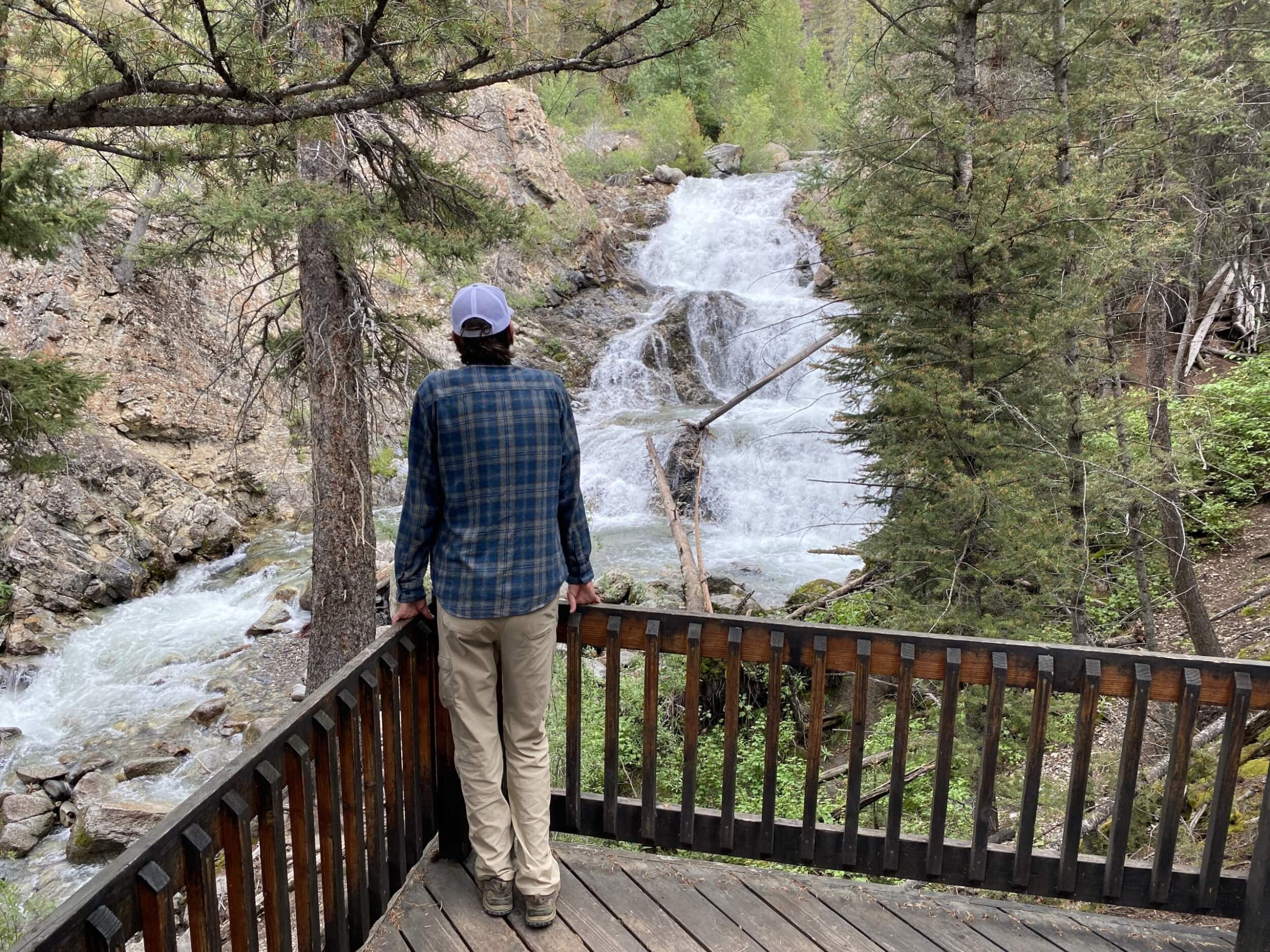 Four Ways to Explore Trail Creek Road man looks at fall creek falls