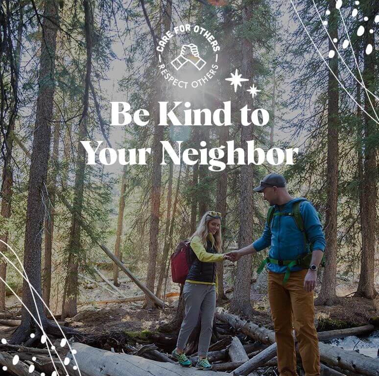 A man reaches out to help a woman wearing a backpack walk through the forest, with text above reading, 'Be Kind to Your Neighbor.'