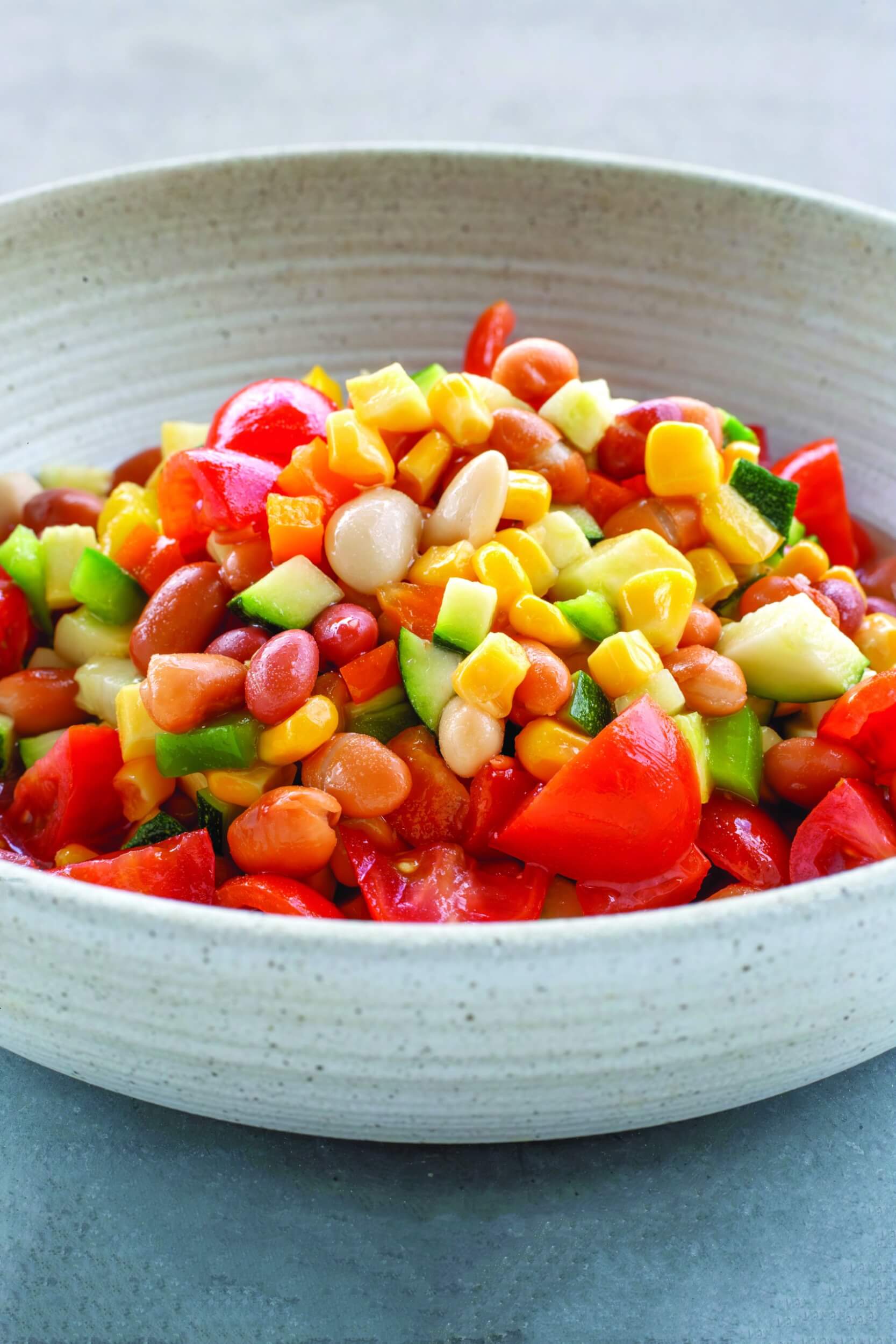 A bowl of colorful veggies and beans in an Native American inspired dish at Powwaw Food Truck.