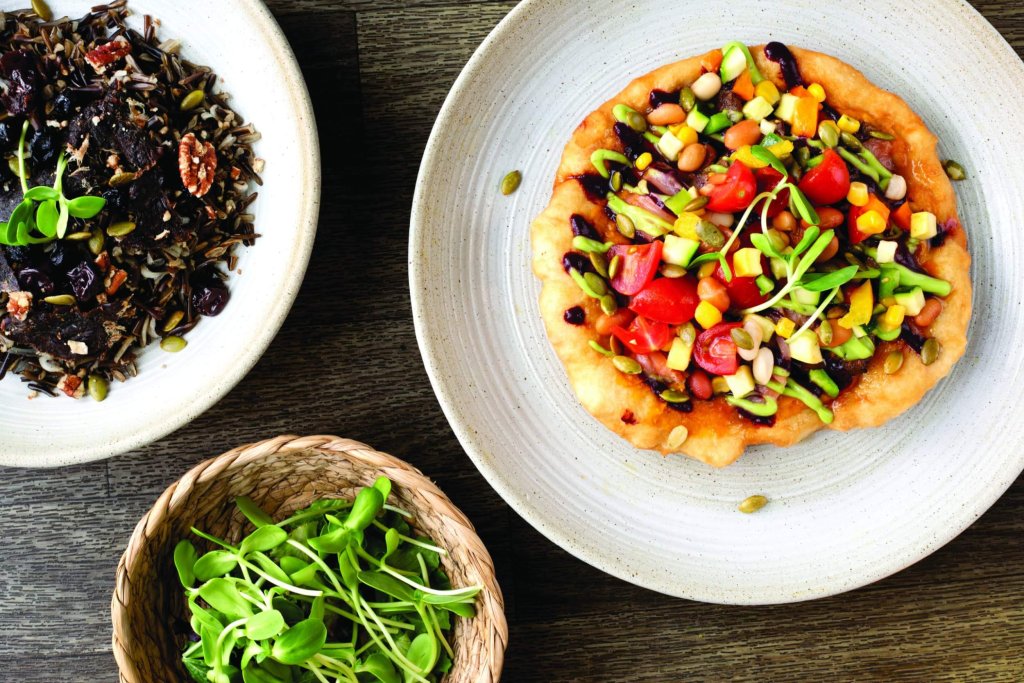 Colorful veggies, beans and frybread in an Native American inspired dish at Powwaw Food Truck.
