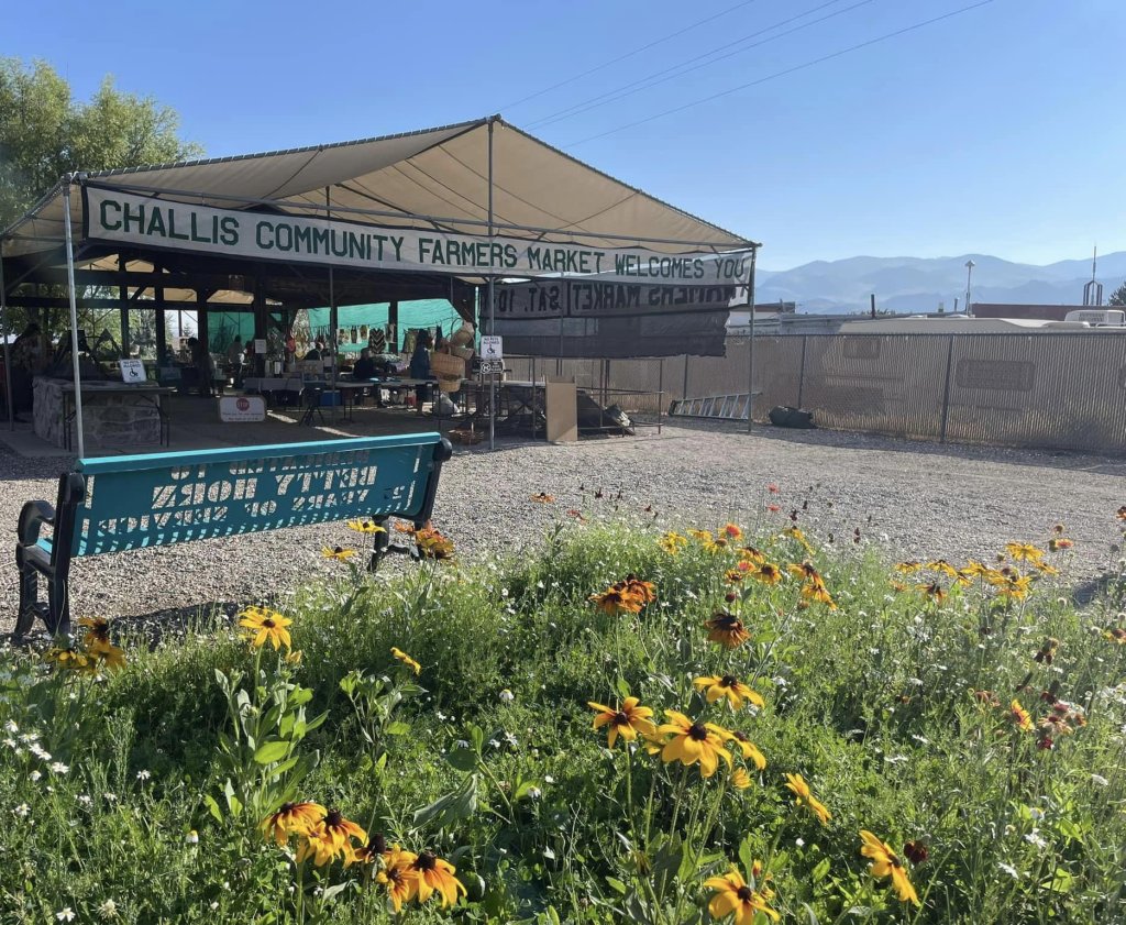 the exterior of a large, open air ten at the Challis Community Farmers Market.