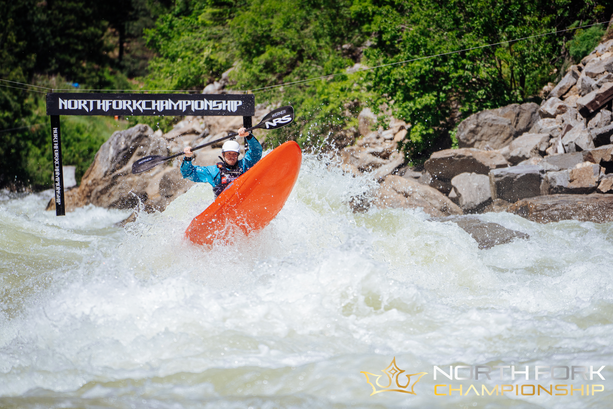 kayaker races at north fork championship on payette river