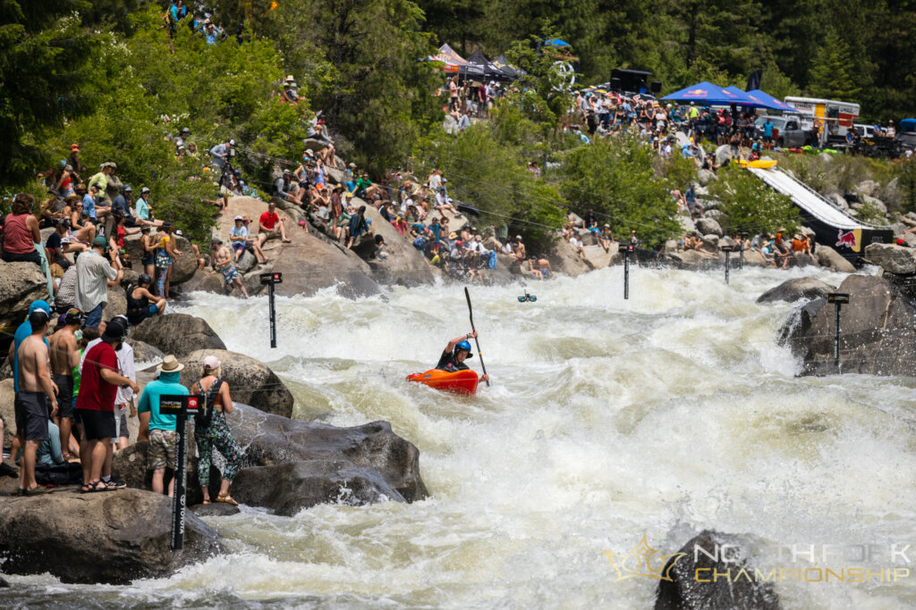 kayaker races down river at north fork championship on payette river