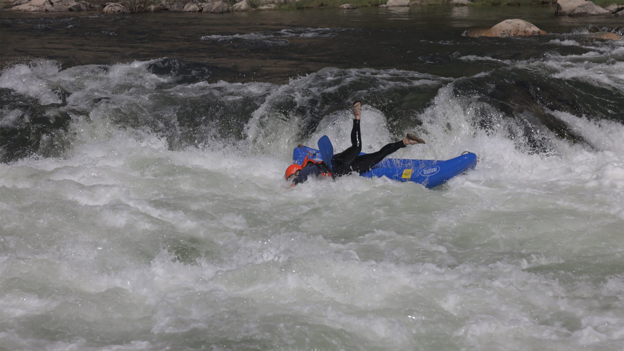 lady kayaks on middle fork
